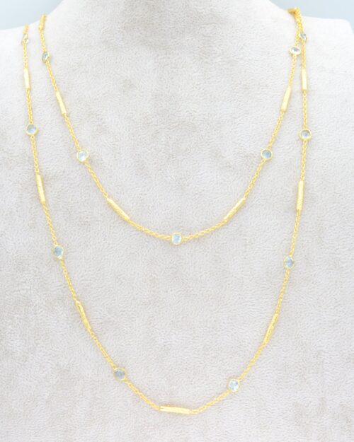 Long blue topaz necklace with textured tube spacers