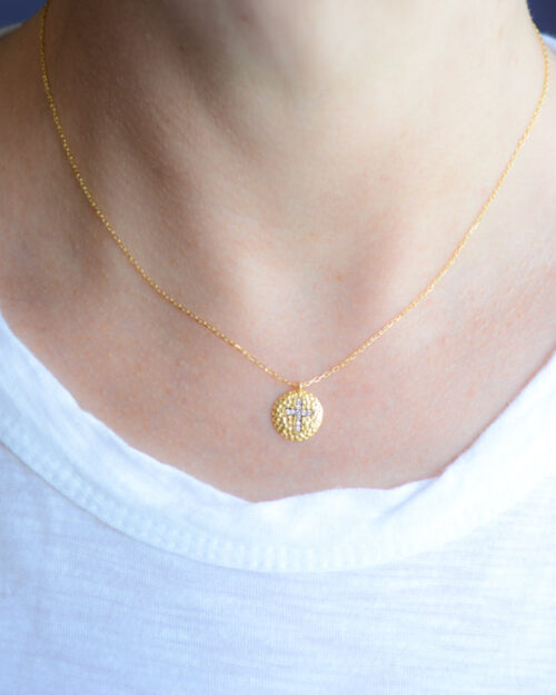 Gold cross necklace with cubic zirconia accents