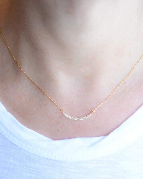 Delicate gold and cubic zirconia crescent necklace