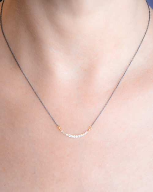 Delicate two-tone cz crescent necklace