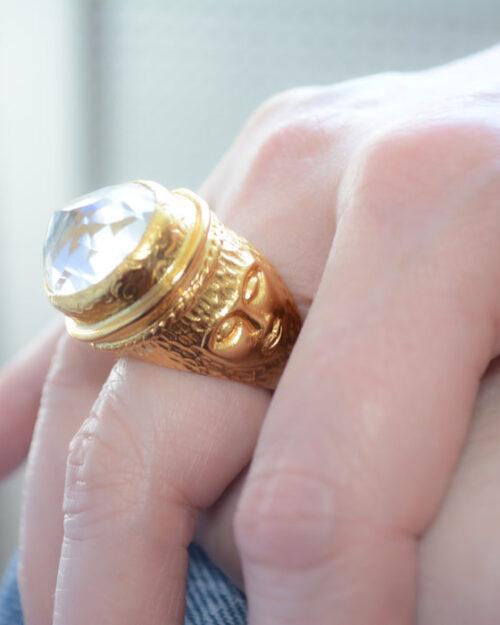 Adjustable gold coin ring with faceted clear crystal